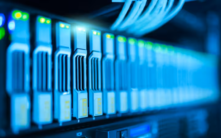 server rack with glowing lights in a modern data center