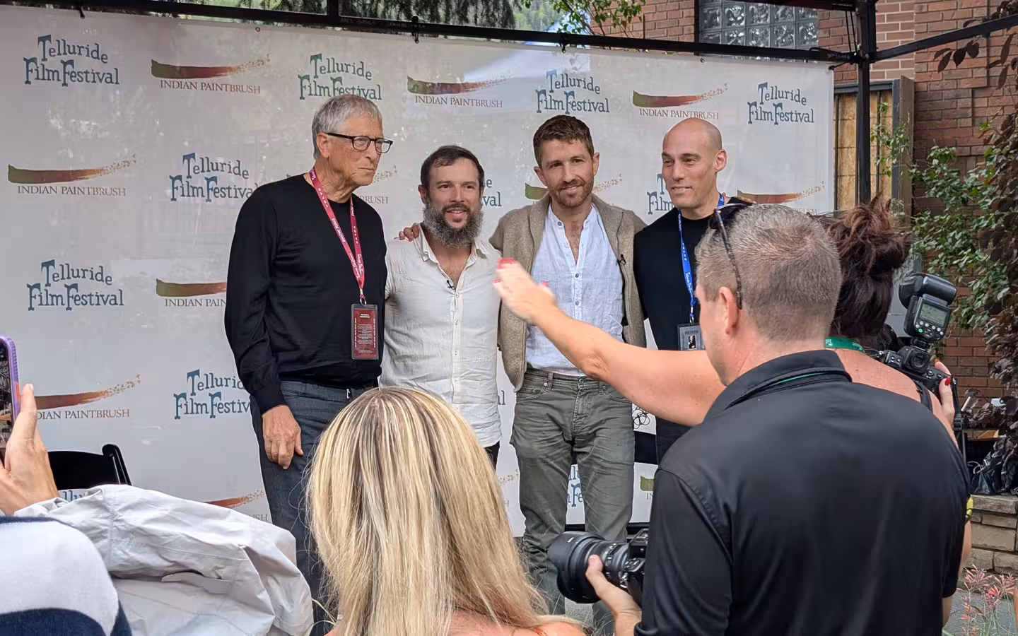 Bill Gates and three other men posing at Telluride Film Festival
