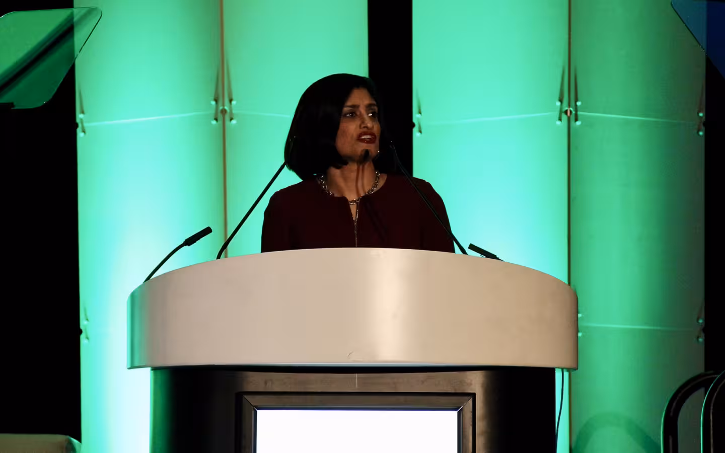 Seema Verma delivering a speech at a podium