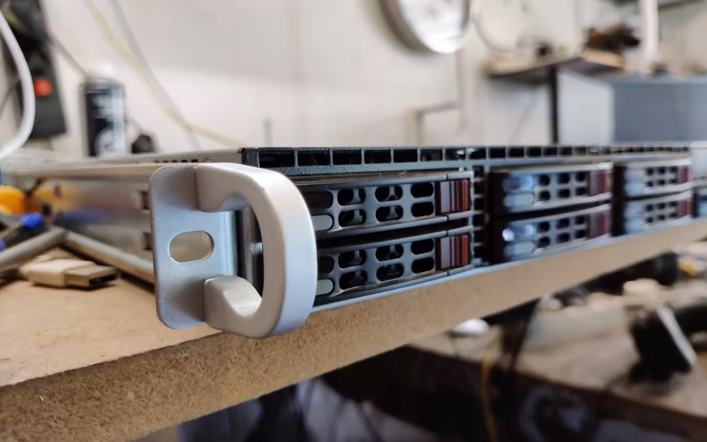 Supermicro server with handle on a workbench close-up