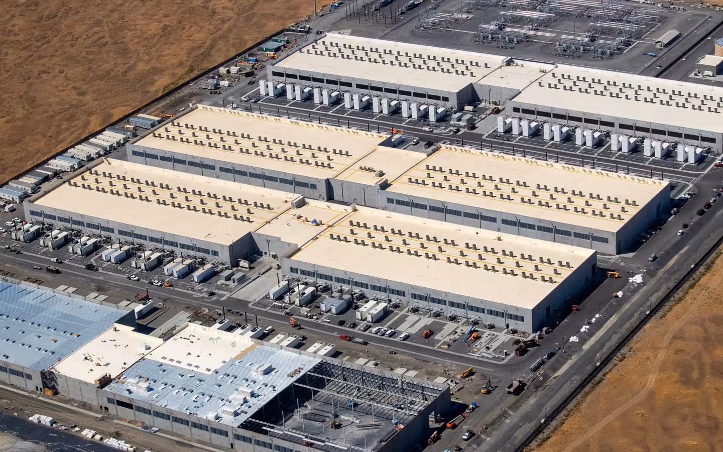 Aerial view of Amazon Web Services data centers and construction in Oregon