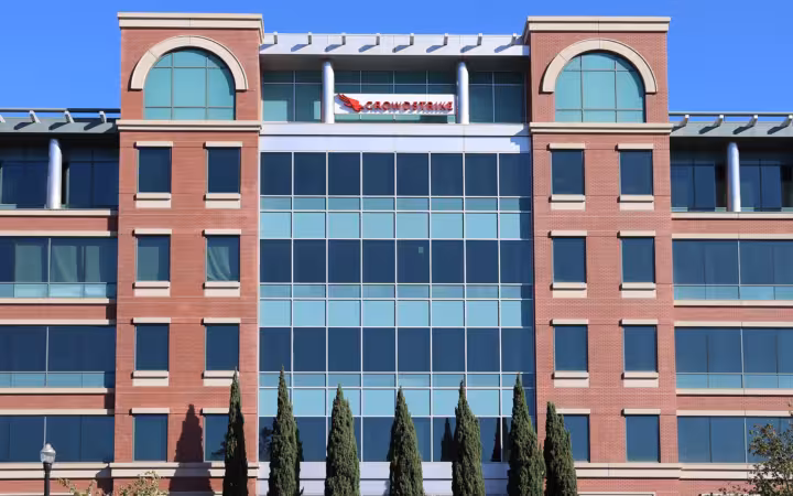 CrowdStrike's Sunnyvale branch office, a brick-and-glass building beneath blue sky