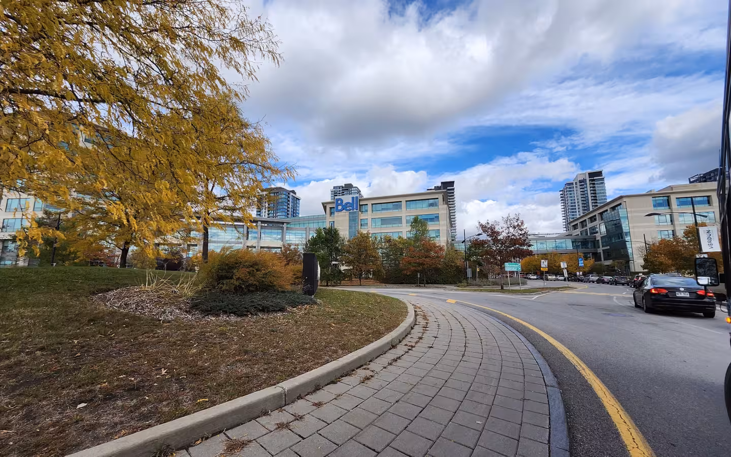 Bell headquarters building with surrounding campus and autumn trees