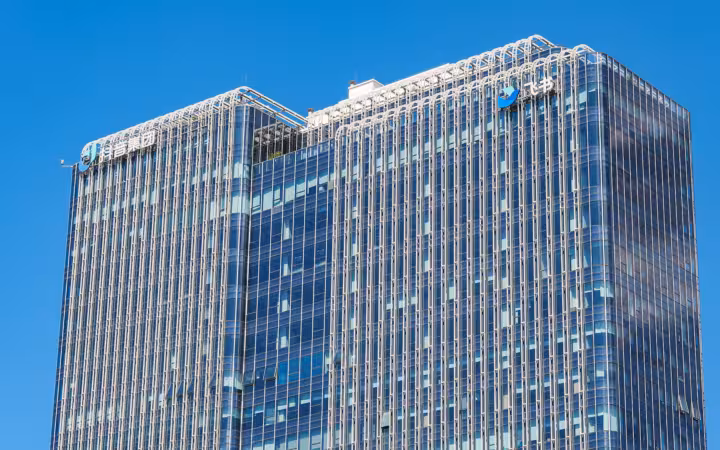 Fashion Vanke Center’s glass facade with Douyin Group and Feishu logos.