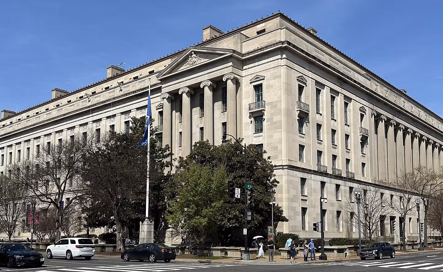 Robert F. Kennedy Department of Justice Building above trees and traffic