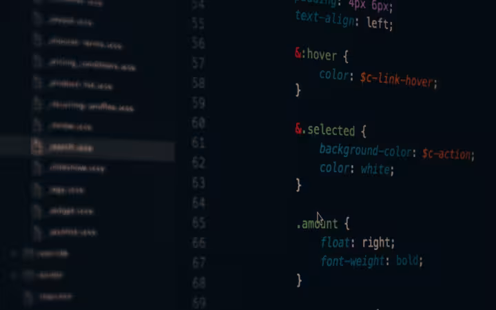 Close-up of colorful CSS code lines on a computer screen for web development.