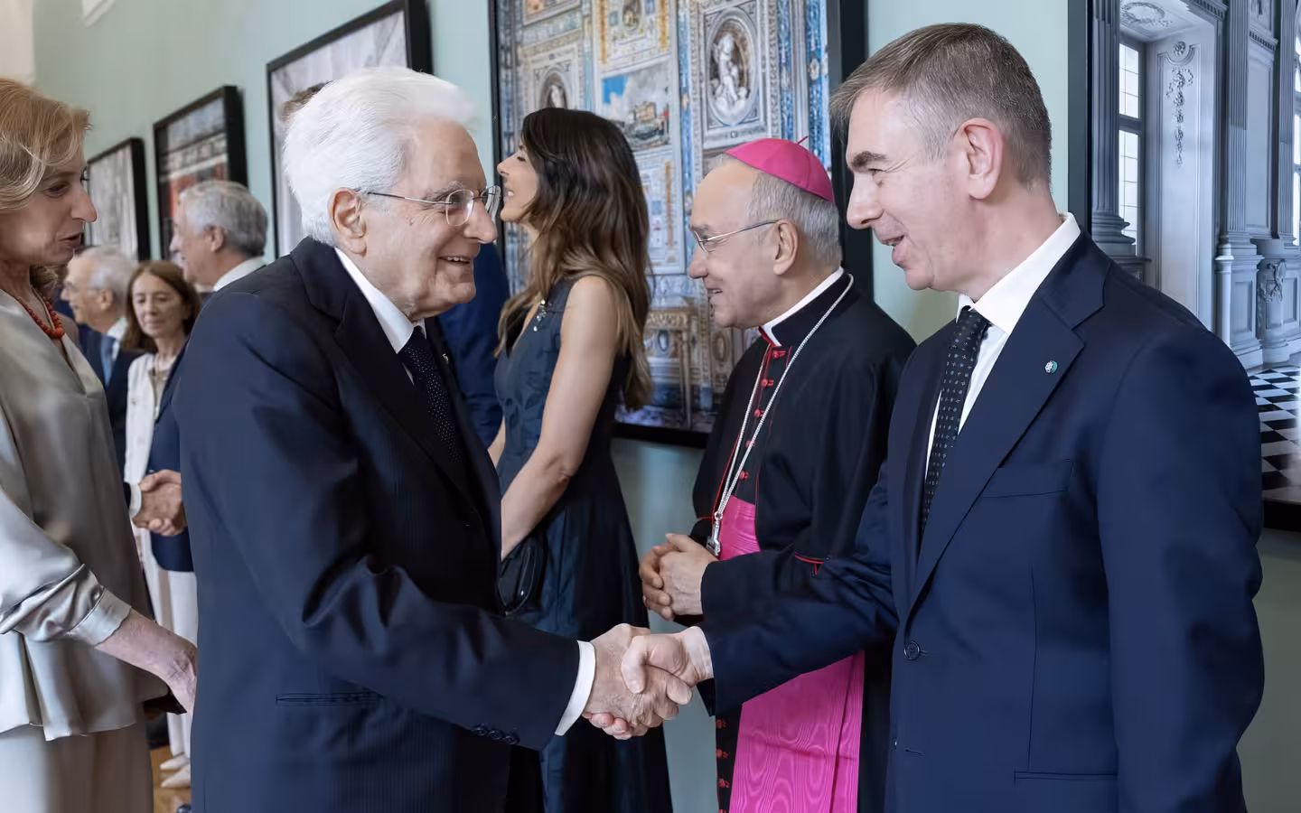 President Sergio Mattarella shakes hands with Federico Silvio Toniato at Palazzo del Quirinale.