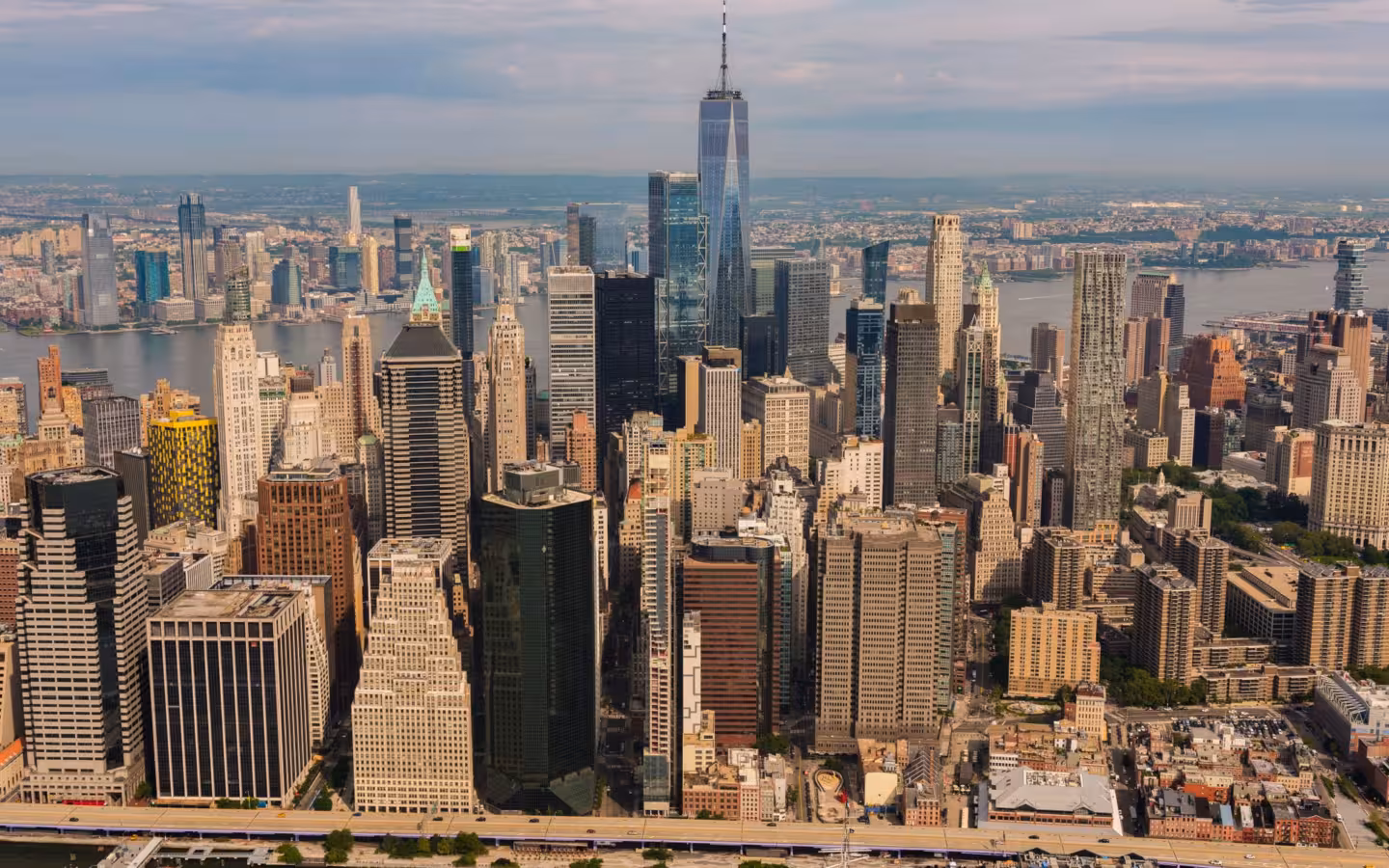 An aerial view of New York City’s skyline, with One World Trade Center prominent.