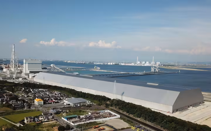 JERA’s Taketoyo thermal power plant beside water and nearby homes