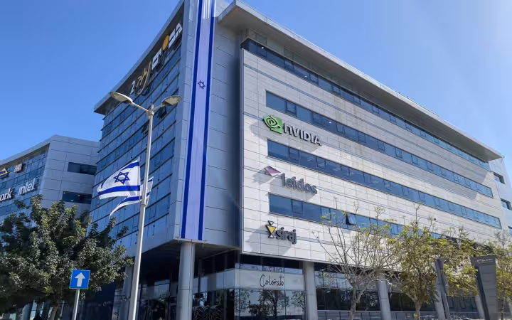 Nvidia office building in Be'er Sheva with company logos and Israeli flags