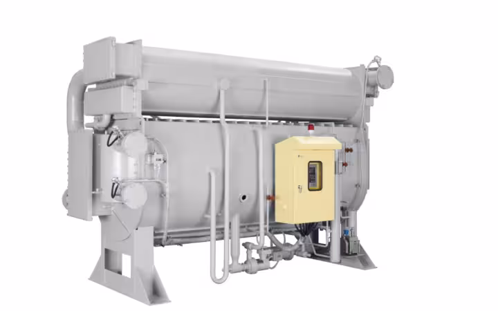 An LG Electronics chiller with gray industrial tanks and a yellow control cabinet