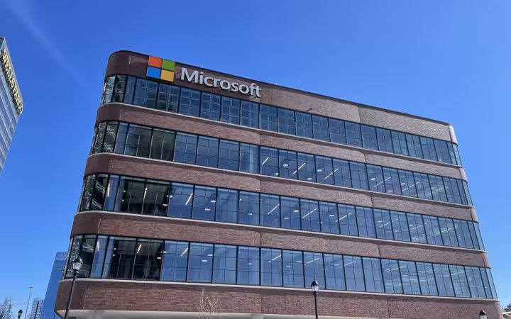 Microsoft building at Atlantic Station in Atlanta beneath a clear blue sky