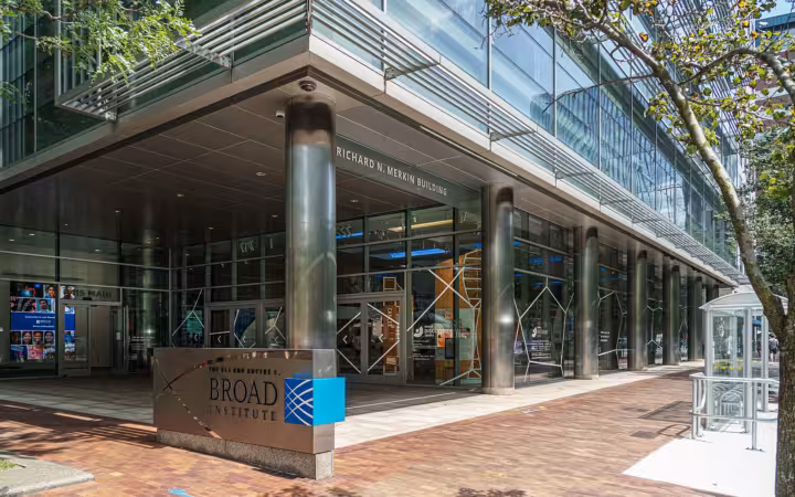 The exterior facade and entrance of the Broad Institute Merkin Building.