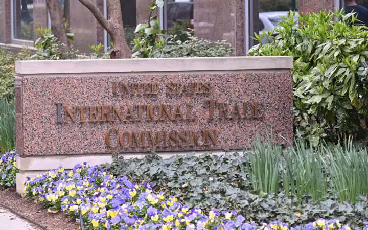 The exterior sign for the United States International Trade Commission building.