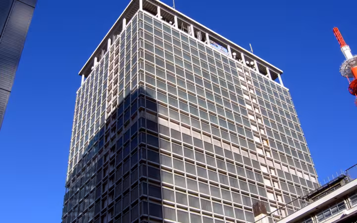 NTT Data Kansai Dojima Building rises against a blue sky in Osaka
