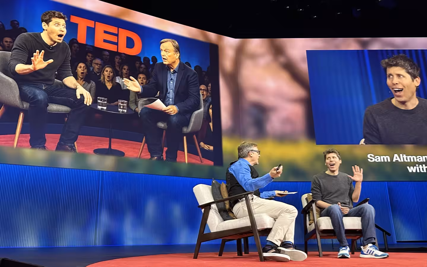 Sam Altman speaking on a TED stage beside an interviewer and projected portraits