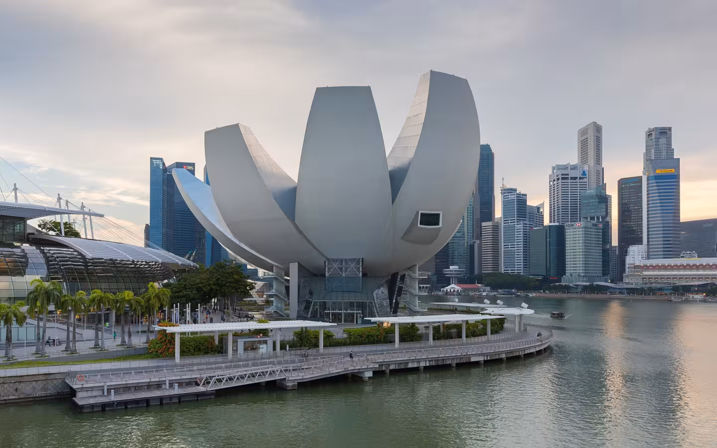 The ArtScience Museum at Marina Bay Sands in Singapore, with the city skyline behind it.