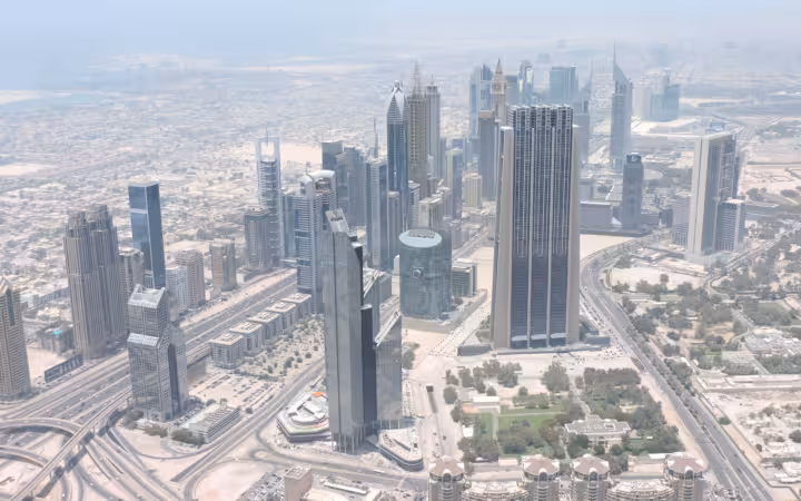 An aerial view of Dubai skyscrapers, roads and the financial centre