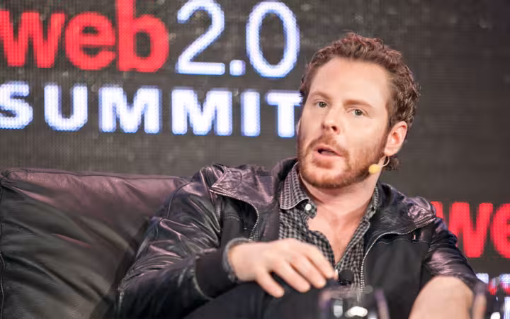 Sean Parker seated onstage before a Web 2.0 Summit backdrop.
