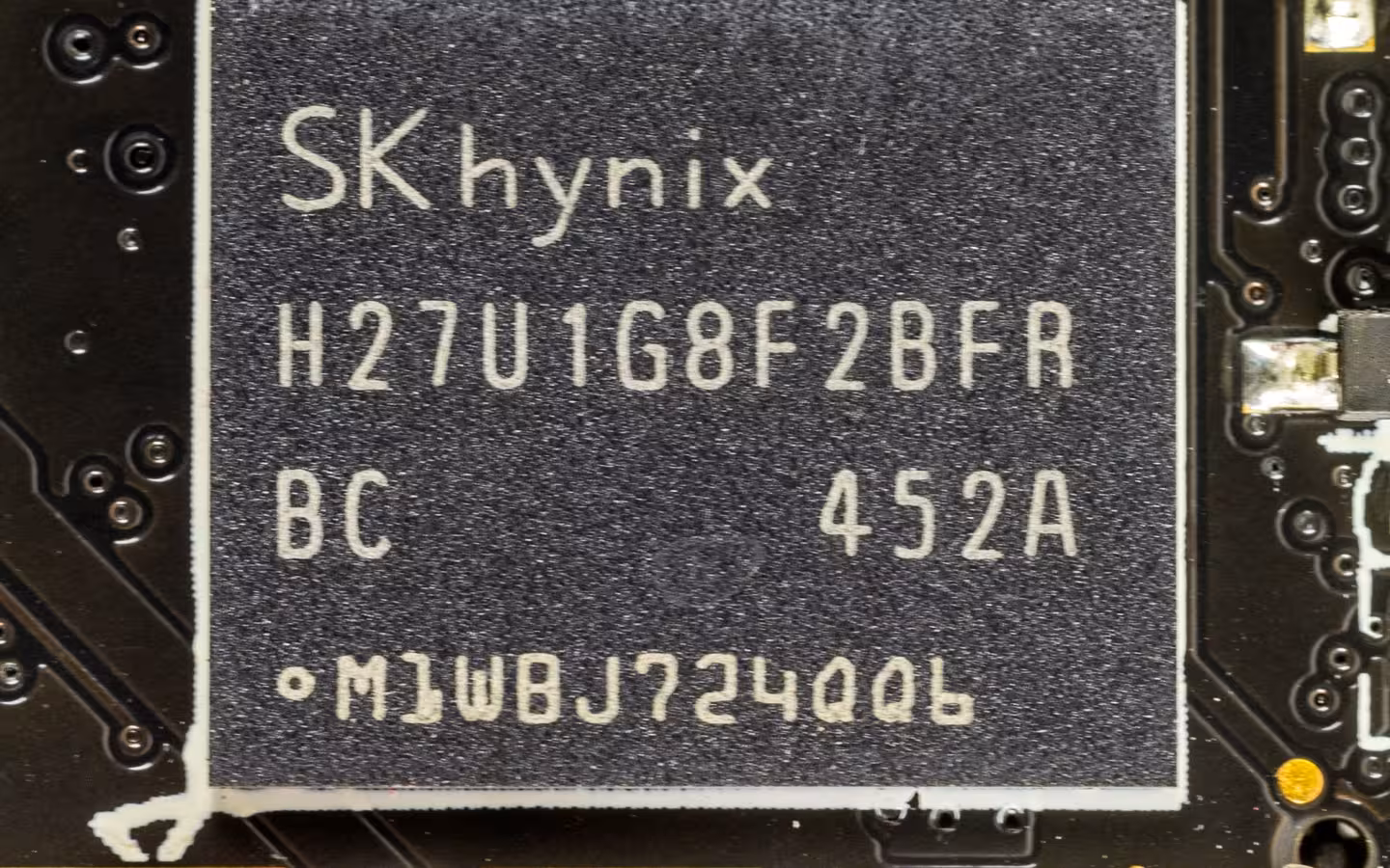 A close-up of an SK hynix NAND flash chip on a circuit board