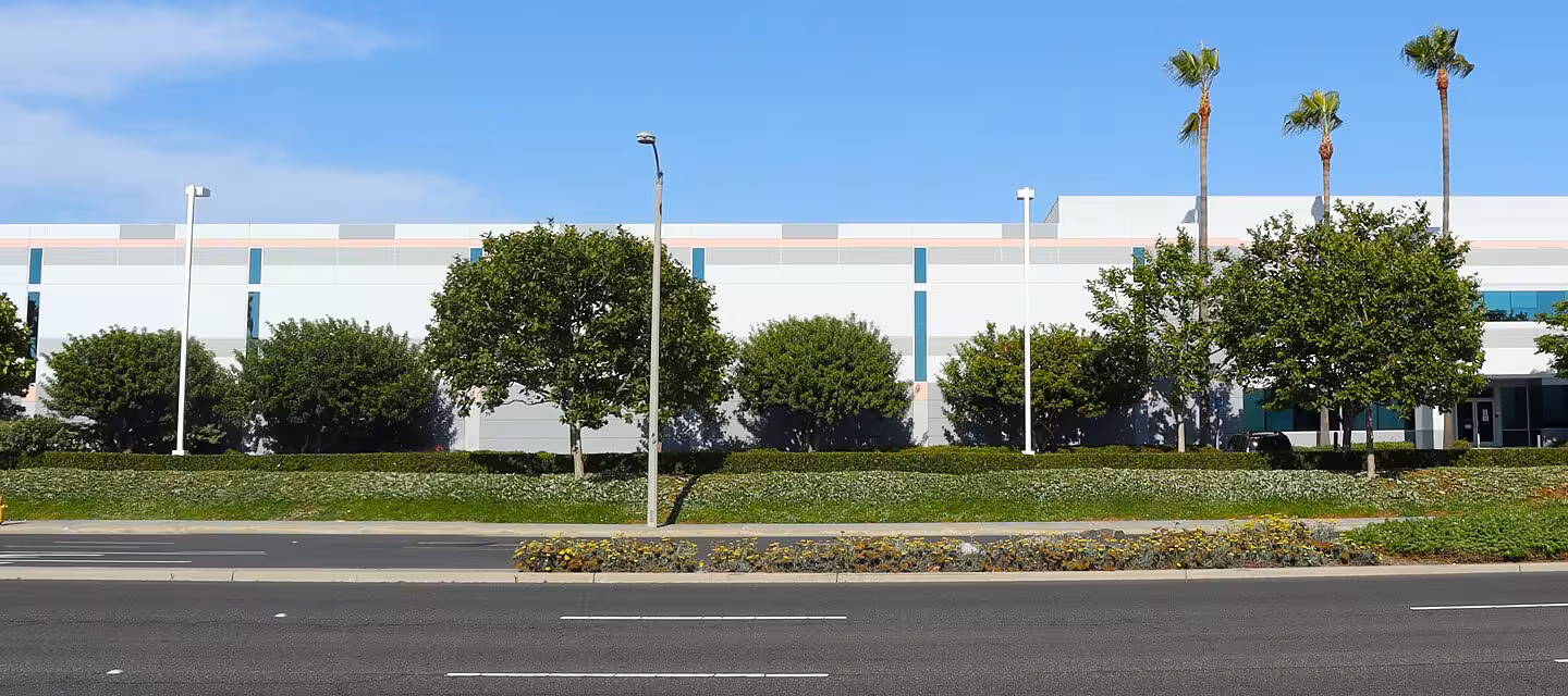 Wide exterior view of the TDK Corporation of America headquarters building in California