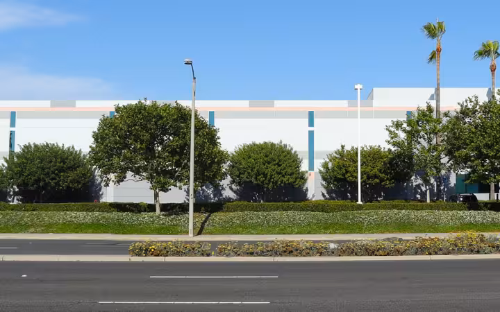 Wide exterior view of the TDK Corporation of America headquarters building in California
