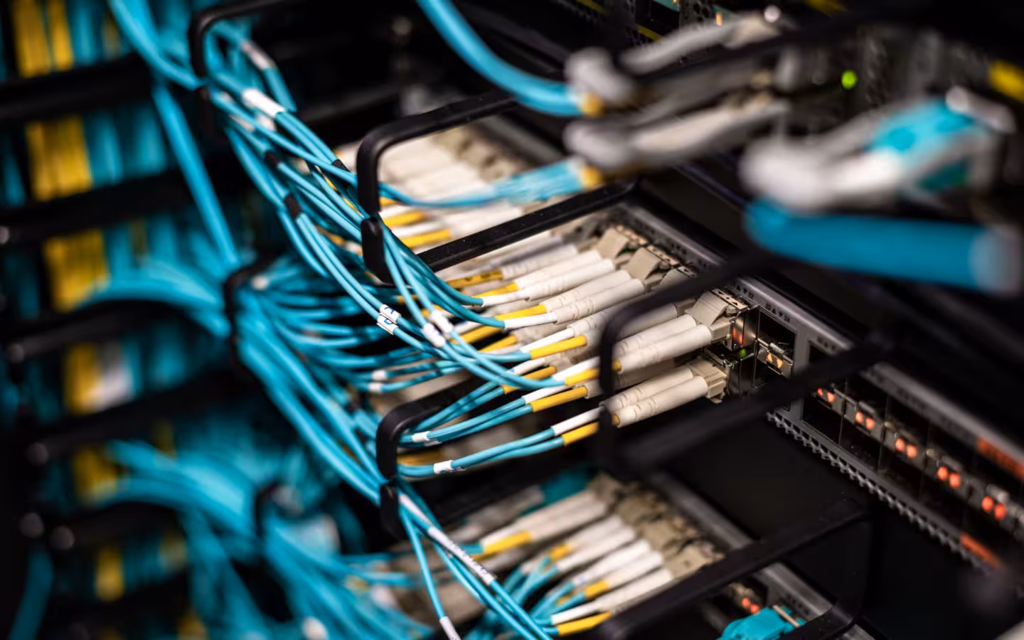 Numerous wires and cables mounted into server patch panel in modern data center
